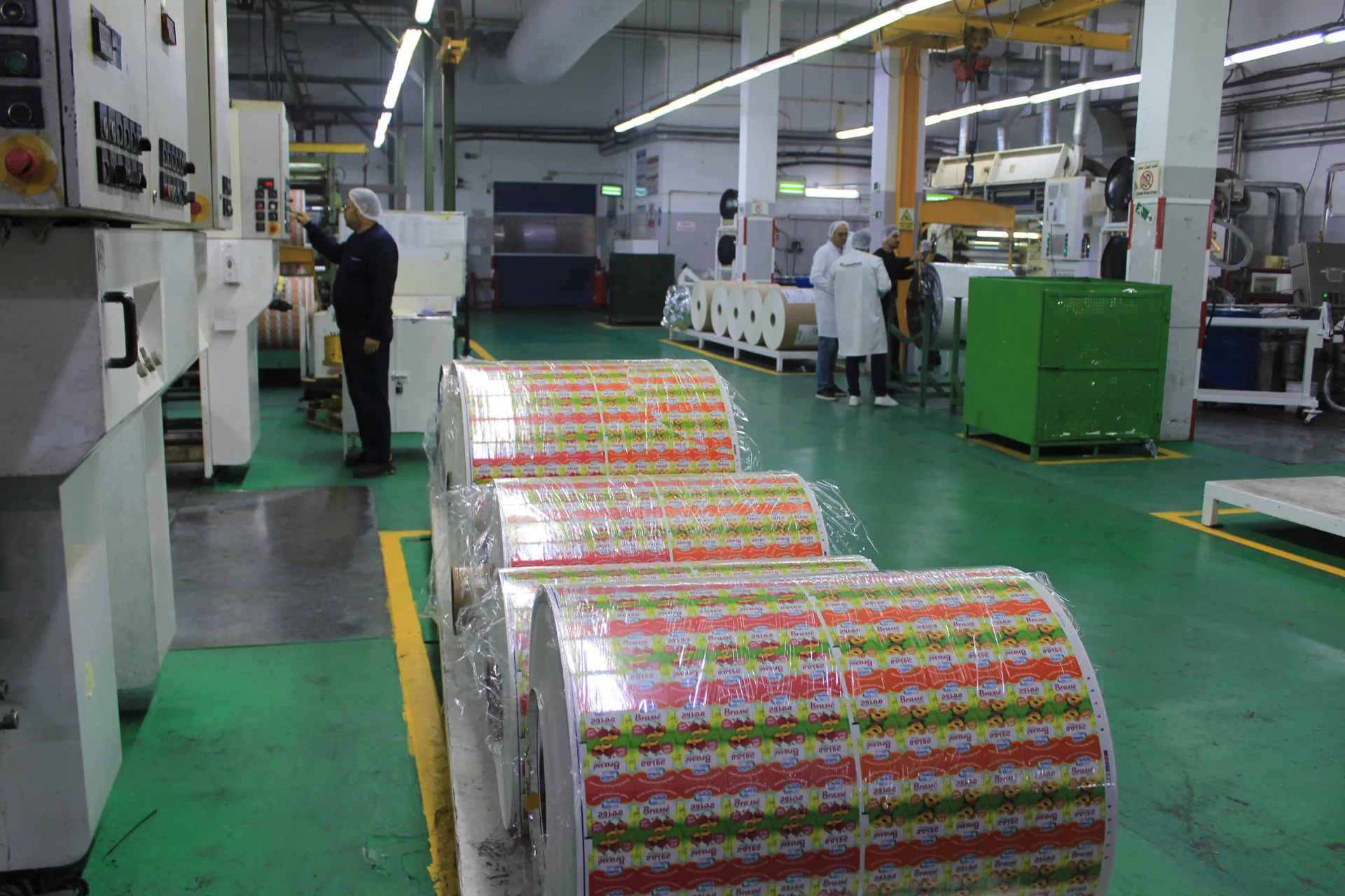 Reels of printed laminates leaving the lamination line — Altea Packaging